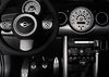 The Mini : 2006 Mini Cooper S, Sports package and Premium package, Harmon Kardon sound and Xenon light package, 17-inch run-flats, panaroma sunroof, Getrag 6-speed manual transmission.  I've waited 6 weeks.  Chili red with white roof, white mirrors and white bonnet stripes.